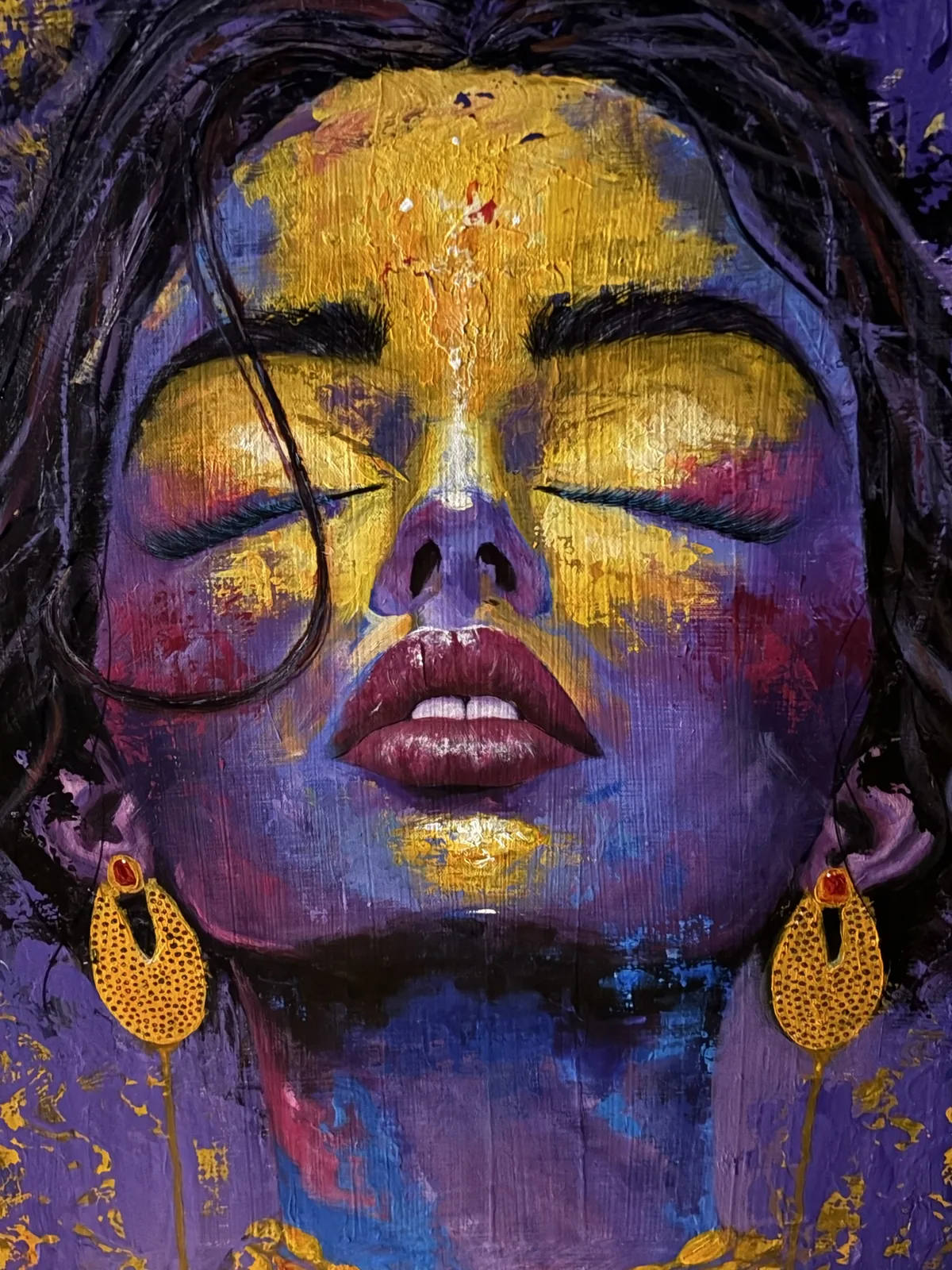 Abstract portrait in purple and gold with gold teardrop earrings